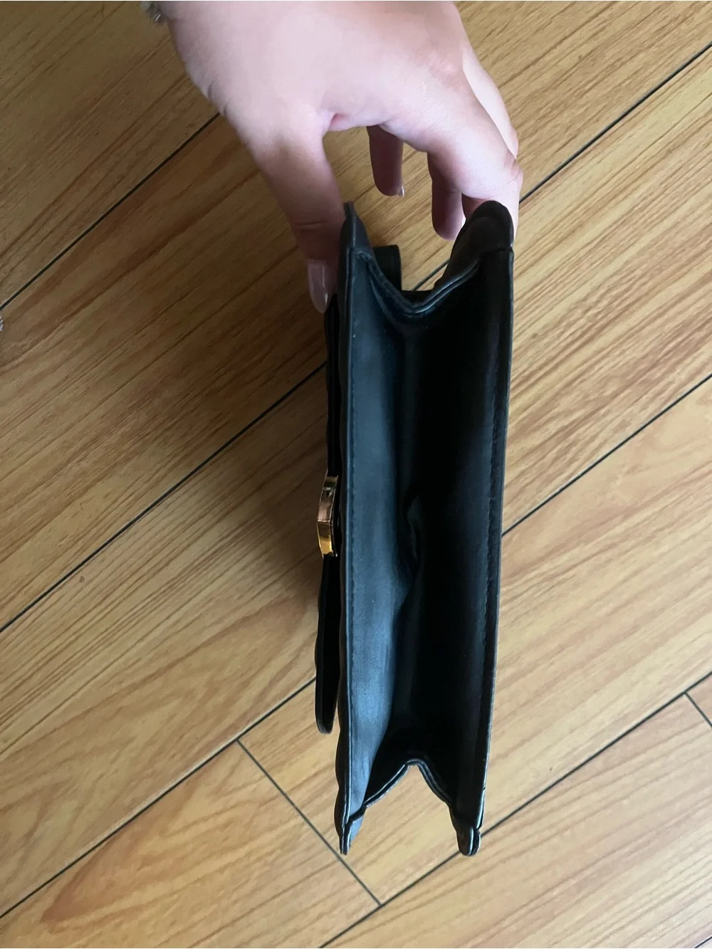 Black Quilted Shoulder Bag with Gold Heart Accent